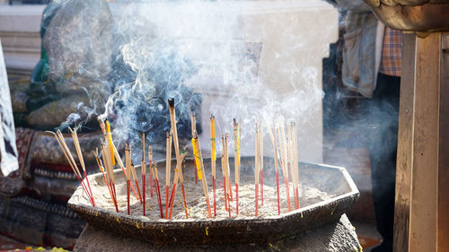 Close-up of burning emitting incenses