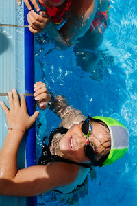 Woman swimming in sea