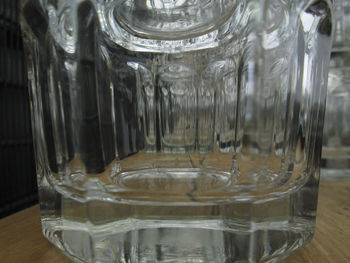 Close-up of glass jar on table