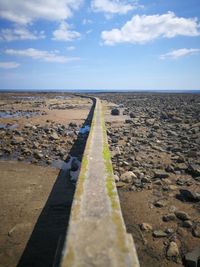 Surface level of road against sky