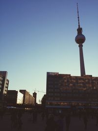Low angle view of fernsehturm tower against clear sky