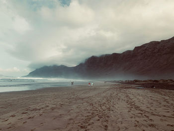 Scenic view of beach against sky