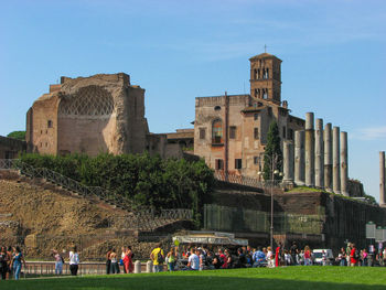 Group of people in front of historical building