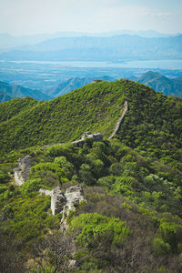 Scenic view of landscape against sky with the great wall of china 
