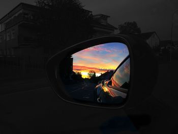 Reflection of car on side-view mirror