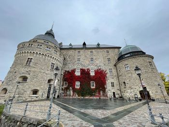 Low angle view of historical building against sky