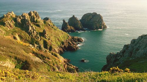 High angle view of rocks by sea