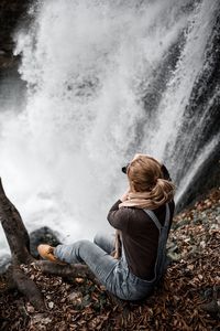 Man sitting on rock