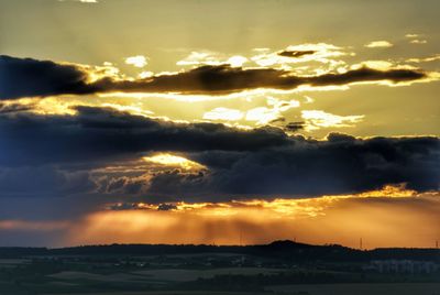 Scenic view of dramatic sky during sunset