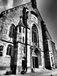 Low angle view of historic building against sky