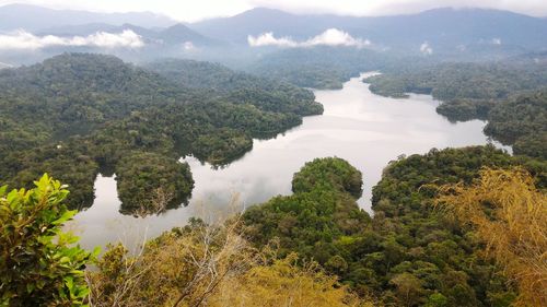 Scenic view of lake with mountains in background