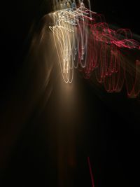 Close-up of light trails against black background