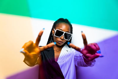 Portrait of young woman in sunglasses