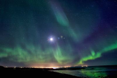 Scenic view of sea at night