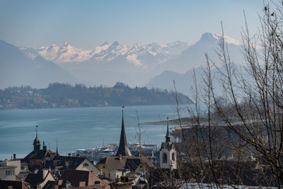 Lucerne, switzerland, march 10, 2022 view over the lake and the city with the beautiful alps 