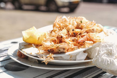 Close-up of prawns shells on table