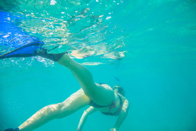 Woman snorkeling in sea