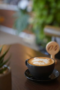 Coffee cup on table