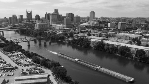 High angle view of river amidst buildings in city