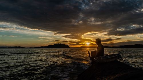 Scenic view of sea against sky during sunset