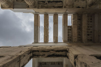 View of old building against cloudy sky