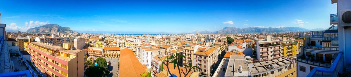 Panoramic view of cityscape against sky