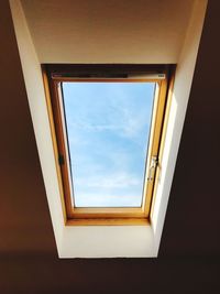 Low angle view of skylight in building