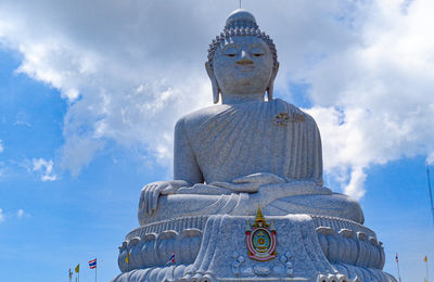 Low angle view of buddha statue 