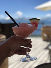 Close-up of hand holding drink