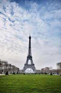 Eiffel tower against sky in city