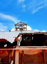 Low angle view of construction site against sky