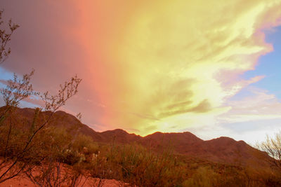 Scenic view of mountains at sunset