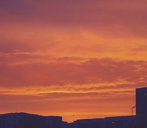 Silhouette of buildings at sunset