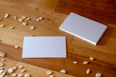 High angle view of paper on table