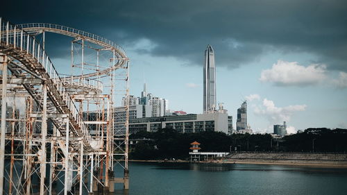 View of factory against cloudy sky