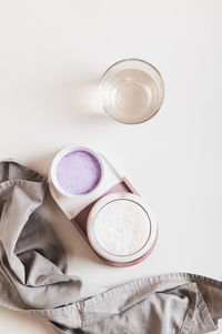 High angle view of beauty products on white background