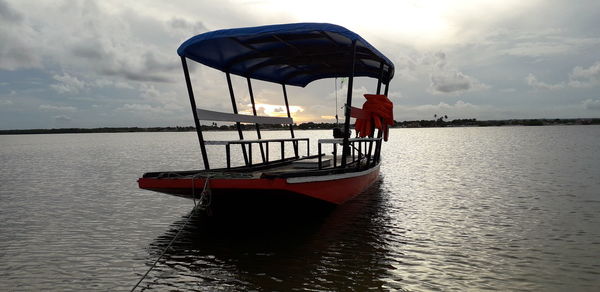 Boat on sea against sky