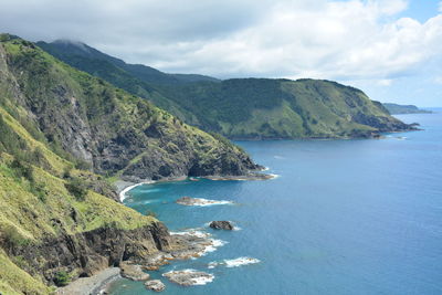 High angle view of bay and sea against sky