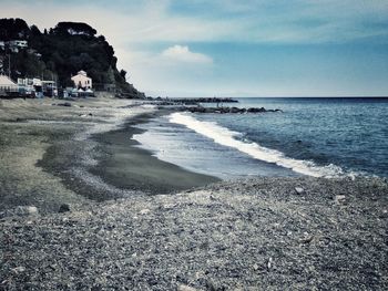 Scenic view of beach against sky