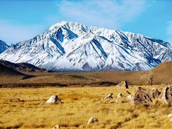 Scenic view of snowcapped mountains against sky