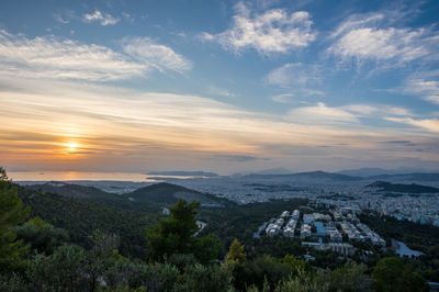 Scenic view of landscape against sky during sunset