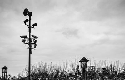 Low angle view of street light against sky