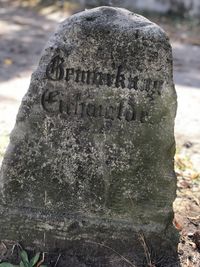 Close-up of stone sculpture in cemetery