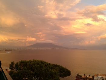 Scenic view of sea against sky at sunset