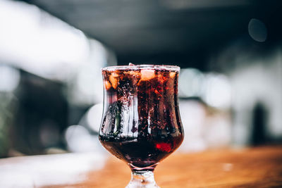 Close-up of beer glass on table