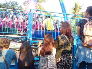 Group of people sitting on chair