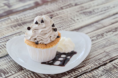 Close-up of cupcake served in plate on table