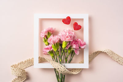 Directly above shot of pink rose on table