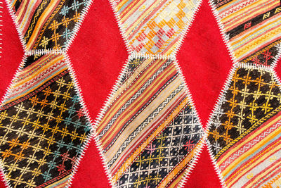 Full frame shot of multi colored umbrellas at market