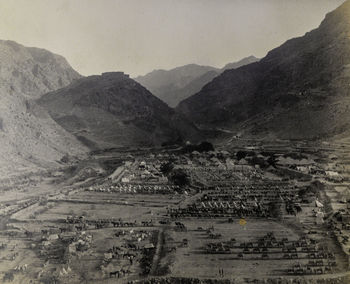 High angle view of road amidst mountains against sky